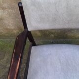 Fauteuil en bois et skaï