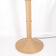 Coconut palm floor lamp in synthetic rattan for outdoor use.