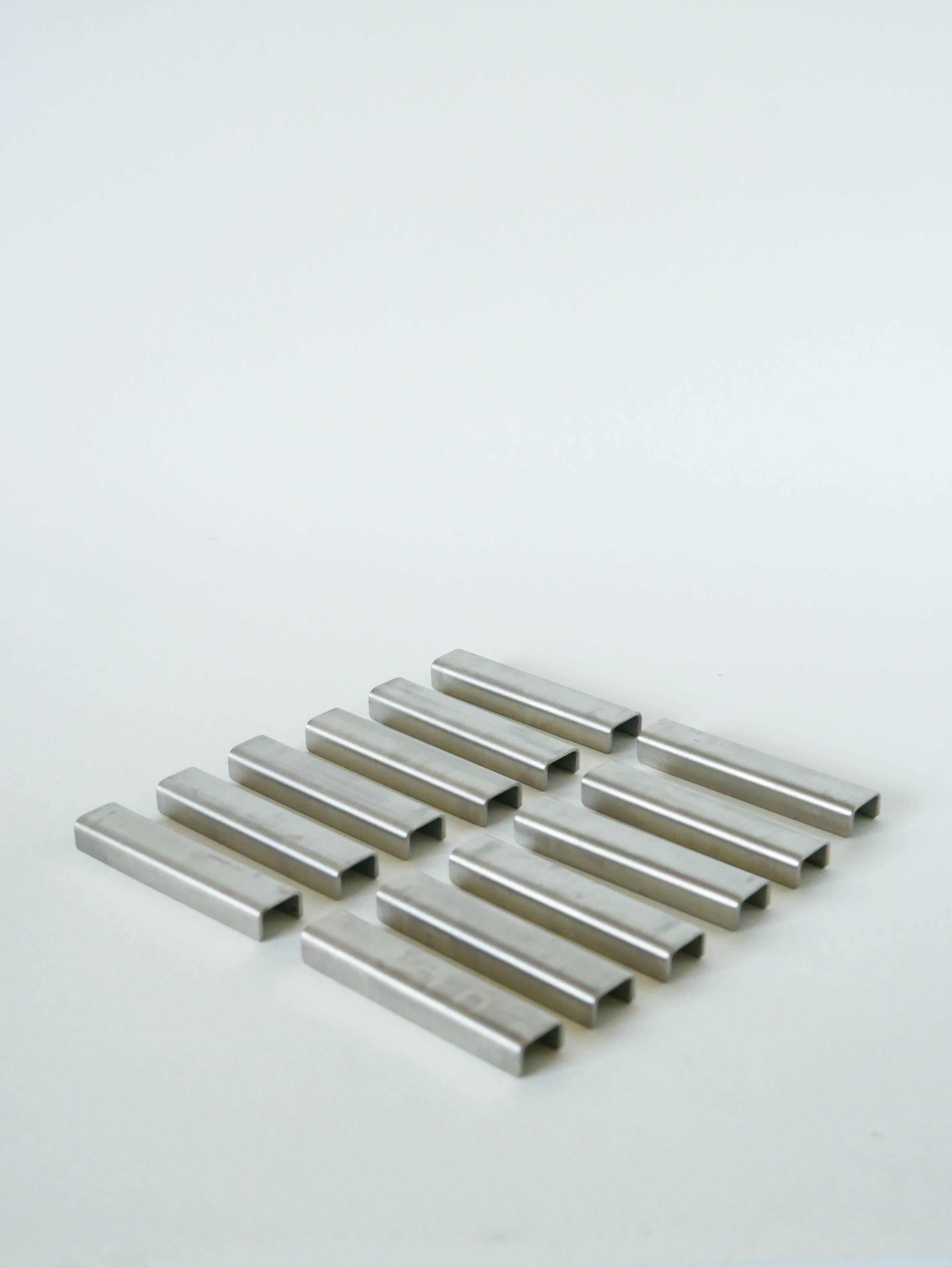 Set of 12 brushed aluminum knife holders, Design, 1970