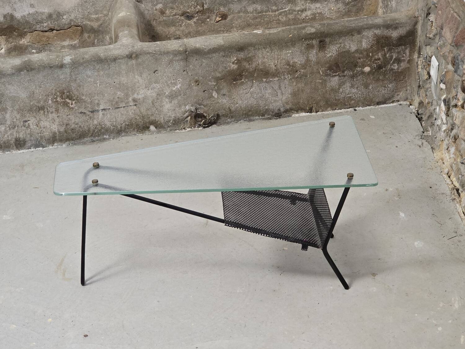 Coffee table in glass and black lacquered metal
