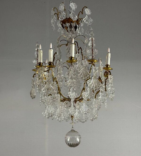 Lustre cage en bronze garni de pampilles en verre moulé en forme de plumes de paon vers 1800