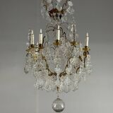 Bronze cage chandelier adorned with molded glass pendants in the shape of peacock feathers, circa 1800