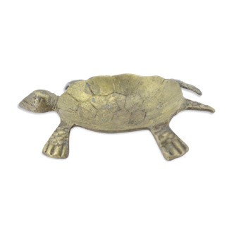 Empty brass turtle pocket