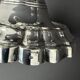 Pair of Chrysalia three-light silver-plated metal candlesticks