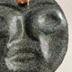 Sculpture face in embossed enamelled brass from the 1960s.
