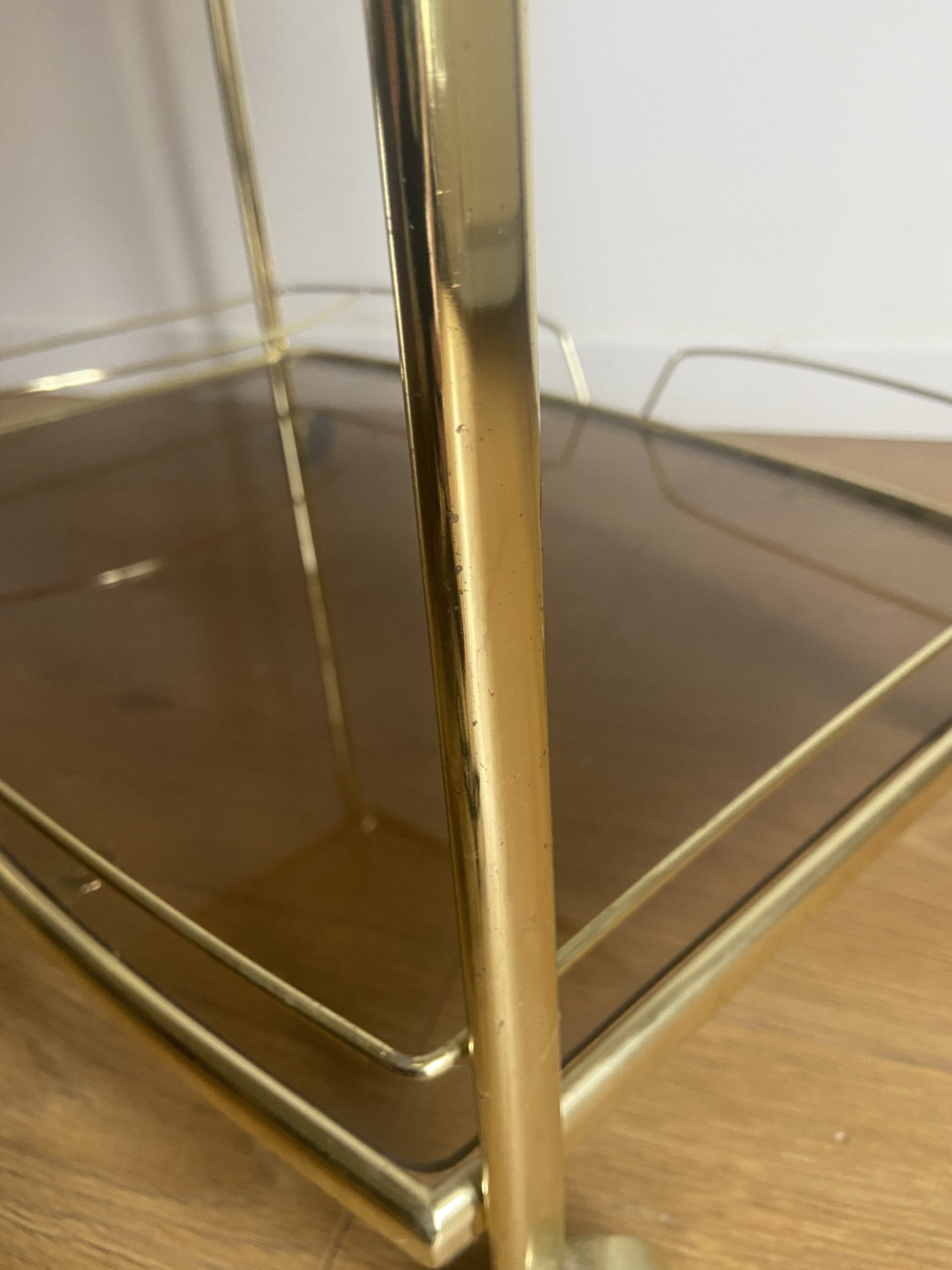 Vintage rolling service in gilded metal and smoked glass