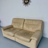 Old 2-seater beige leather sofa designed by Carl Larsson De Sede, vintage 80s
