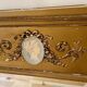 Antique gilded trumeau mirror in Louis XVI style