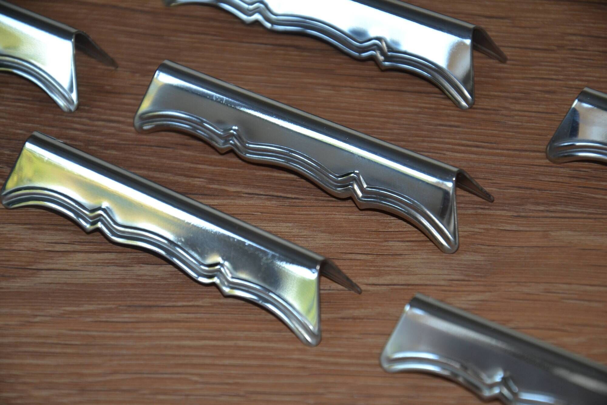 12 silver-plated knife rests