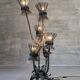 Brutalist floor lamp with five thistle-shaped lights in black wrought iron, 1970s