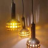 Raak orange three-light space age pendant light, 1970s Netherlands