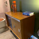 Vintage 1960s bar cabinet, Scandinavian style, on wheels.
