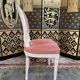 Suite de 4 chaises style Louis XVI médaillon