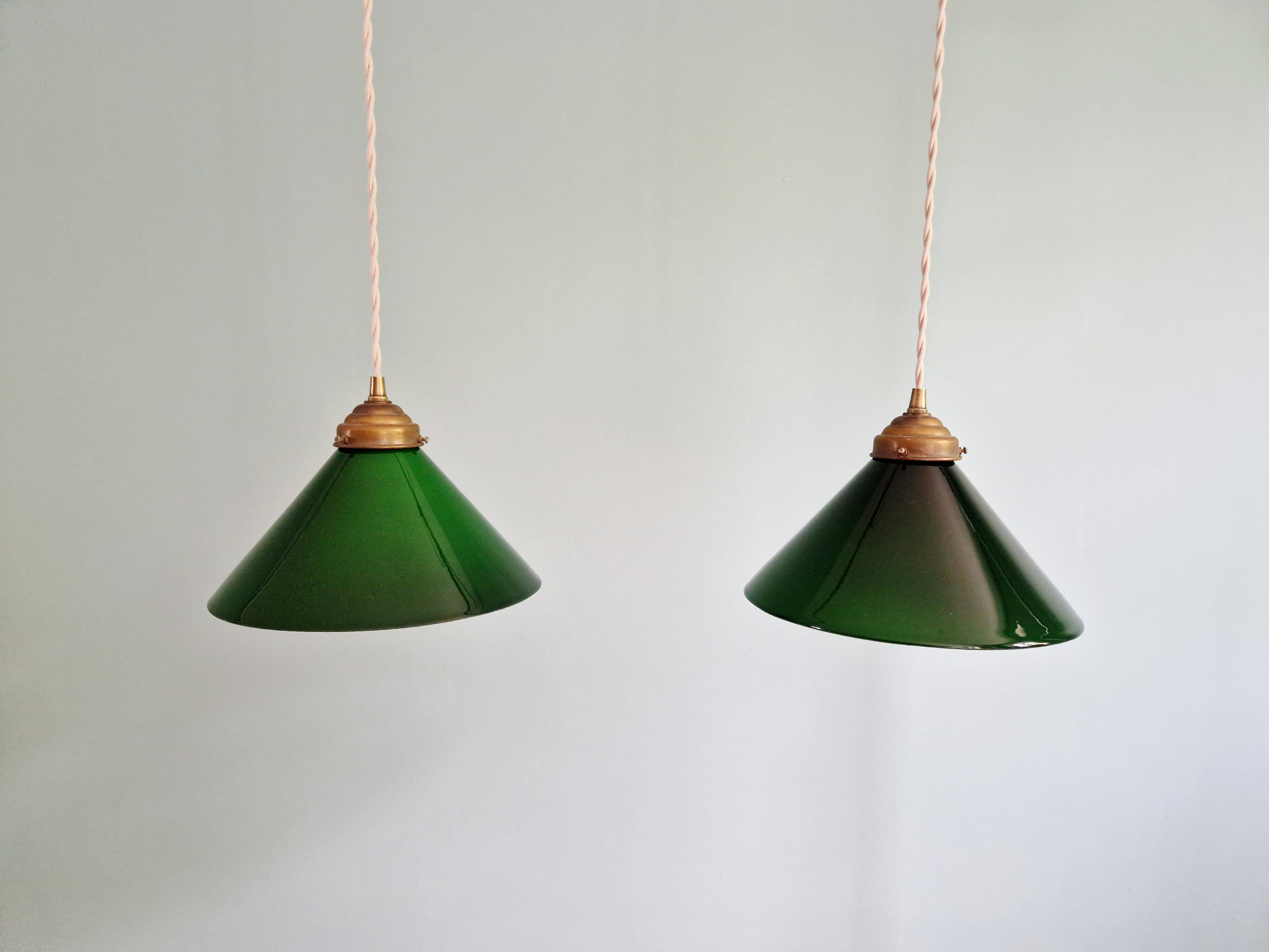 Pair of conical green opaline pendant lights, Art Deco style
