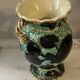 Pair of Vallauris vases in turquoise and black ceramic enhanced with o