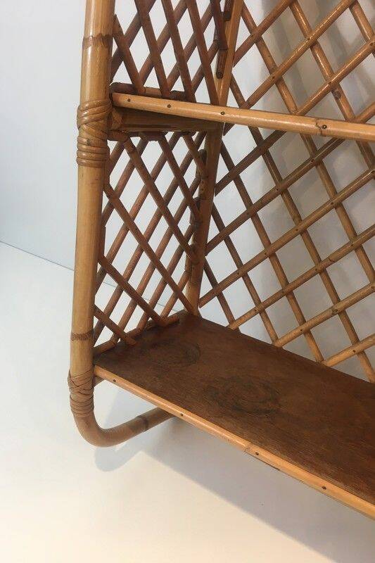 Rattan wall shelf. Attributed to Audoux-Minet