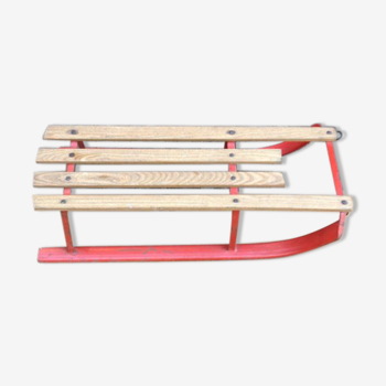 Red sled in metal and wood in the 1960s