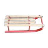 Red sled in metal and wood in the 1960s