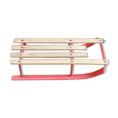 Red sled in metal and wood in the 1960s