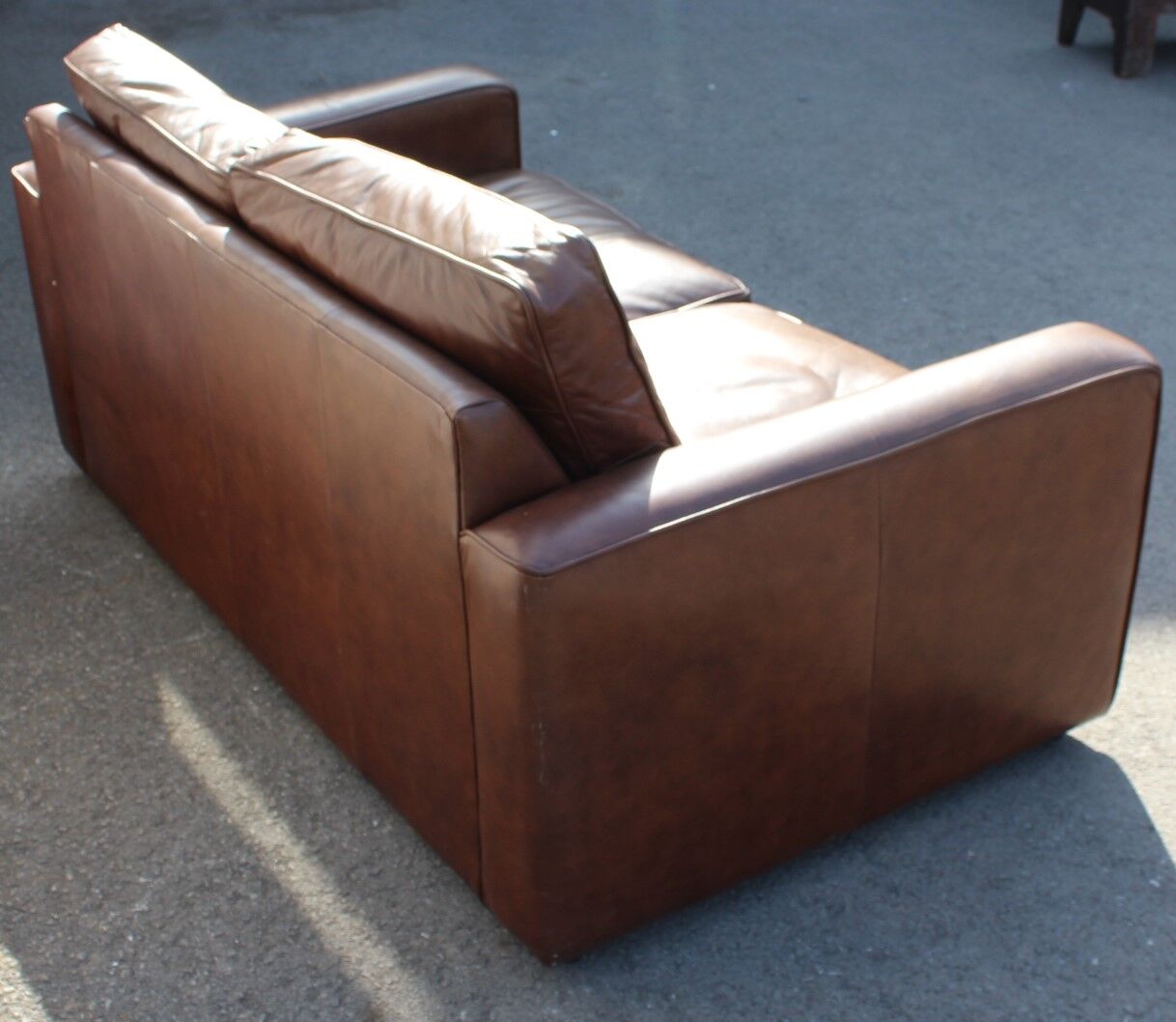 Two seater light brown sofa
