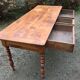 Old cherry farmhouse table with 3 drawers and turned legs