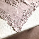 Old embroidered towel tinted purple aurora