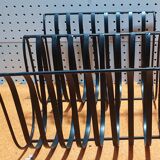 Minimalist metal magazine holder