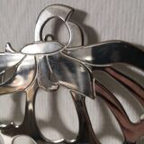 silver-plated metal strawberry-shaped trivet