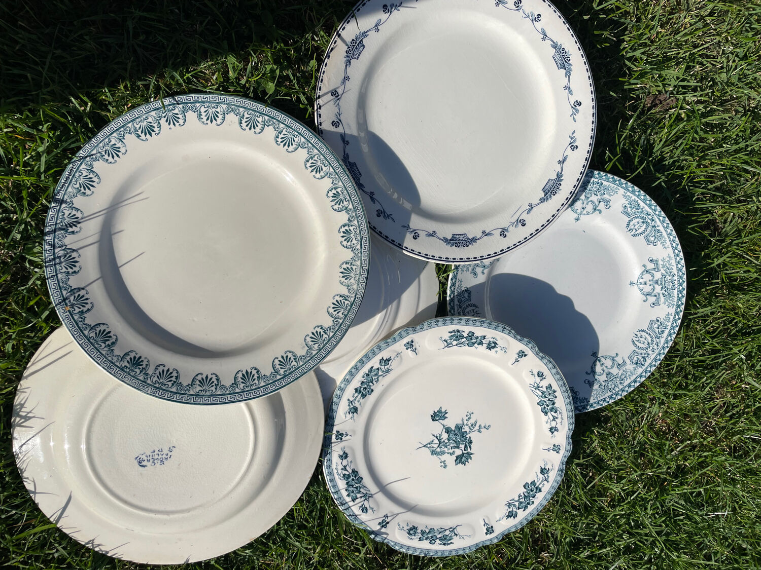 Set of 6 mismatched iron earth flat plates