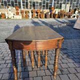 12-foot round oak table with 7 extensions / 20 people