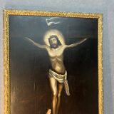 Beautiful religious work from the 17th century, oil on panel representing Christ on his cross with Mary Magdalene at his feet