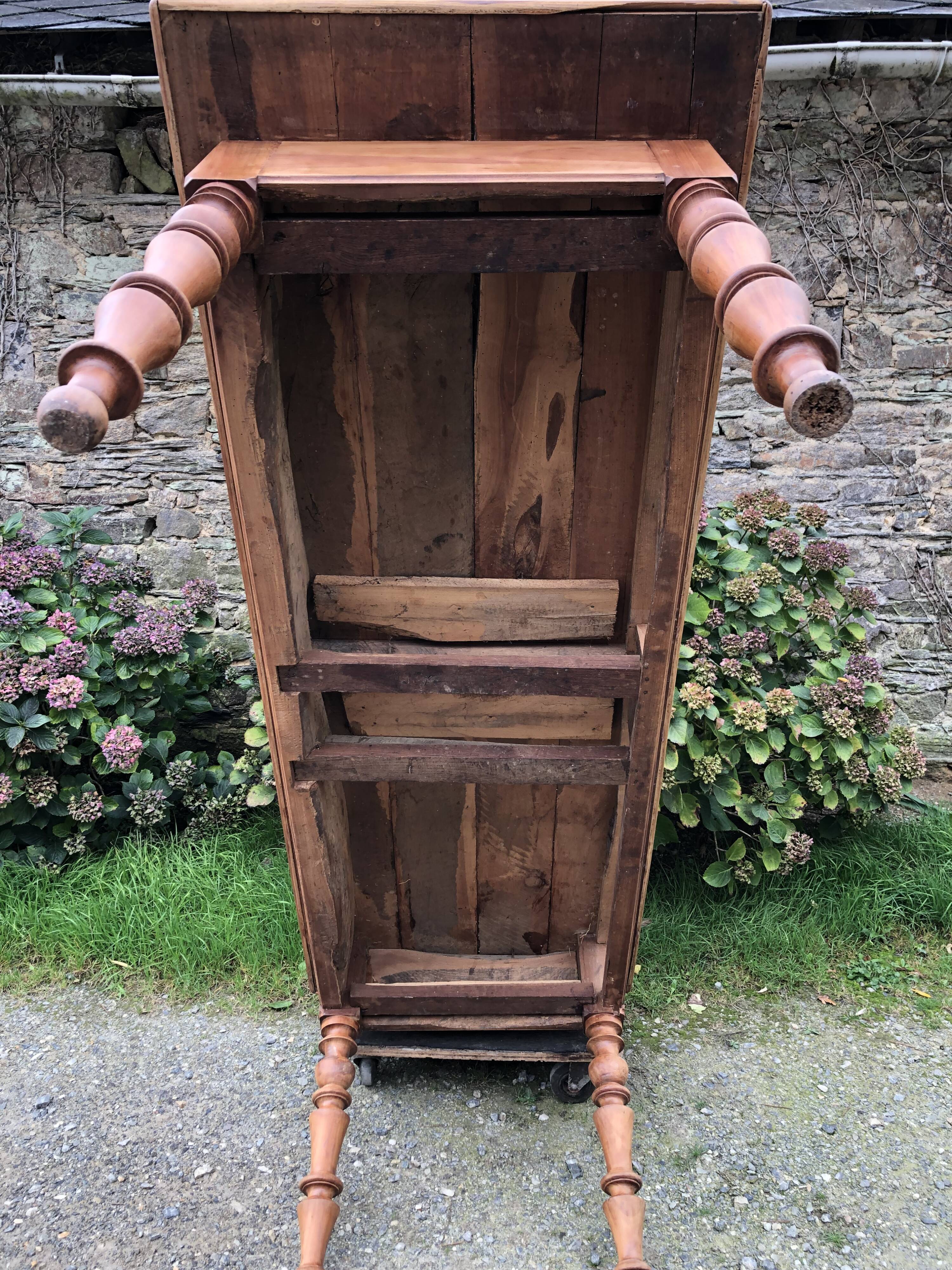 Antique Louis Philippe style farm table in solid cherry wood with 2 drawers and turned base.