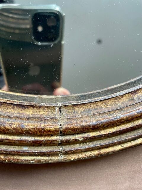 Old mirror in gilded wood early twentieth century