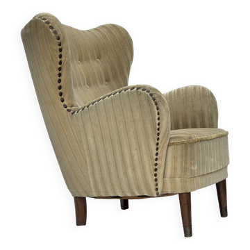 Fauteuil danois des années 1960, revêtement en velours vert clair, bois de hêtre.