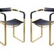 Pair of Wanderlust armchairs with navy blue backrest and brass.
