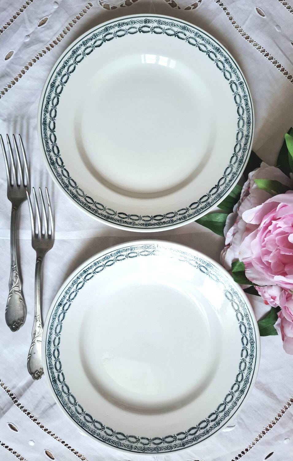 Mismatched antique flat plates made of ironstone accompanied by