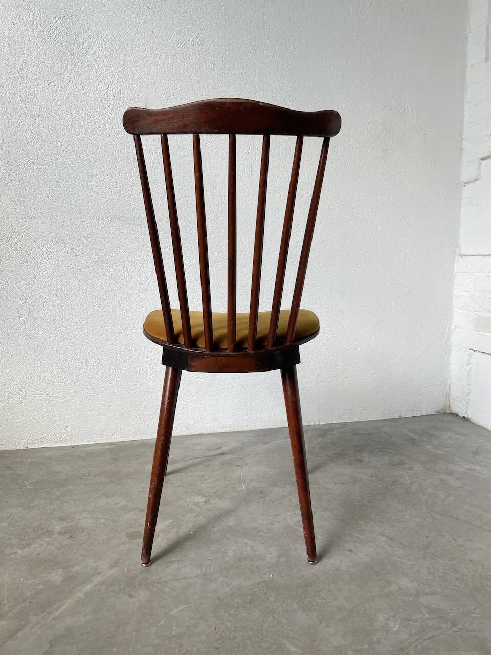 Baumann “Minuet” chair with yellow seat
