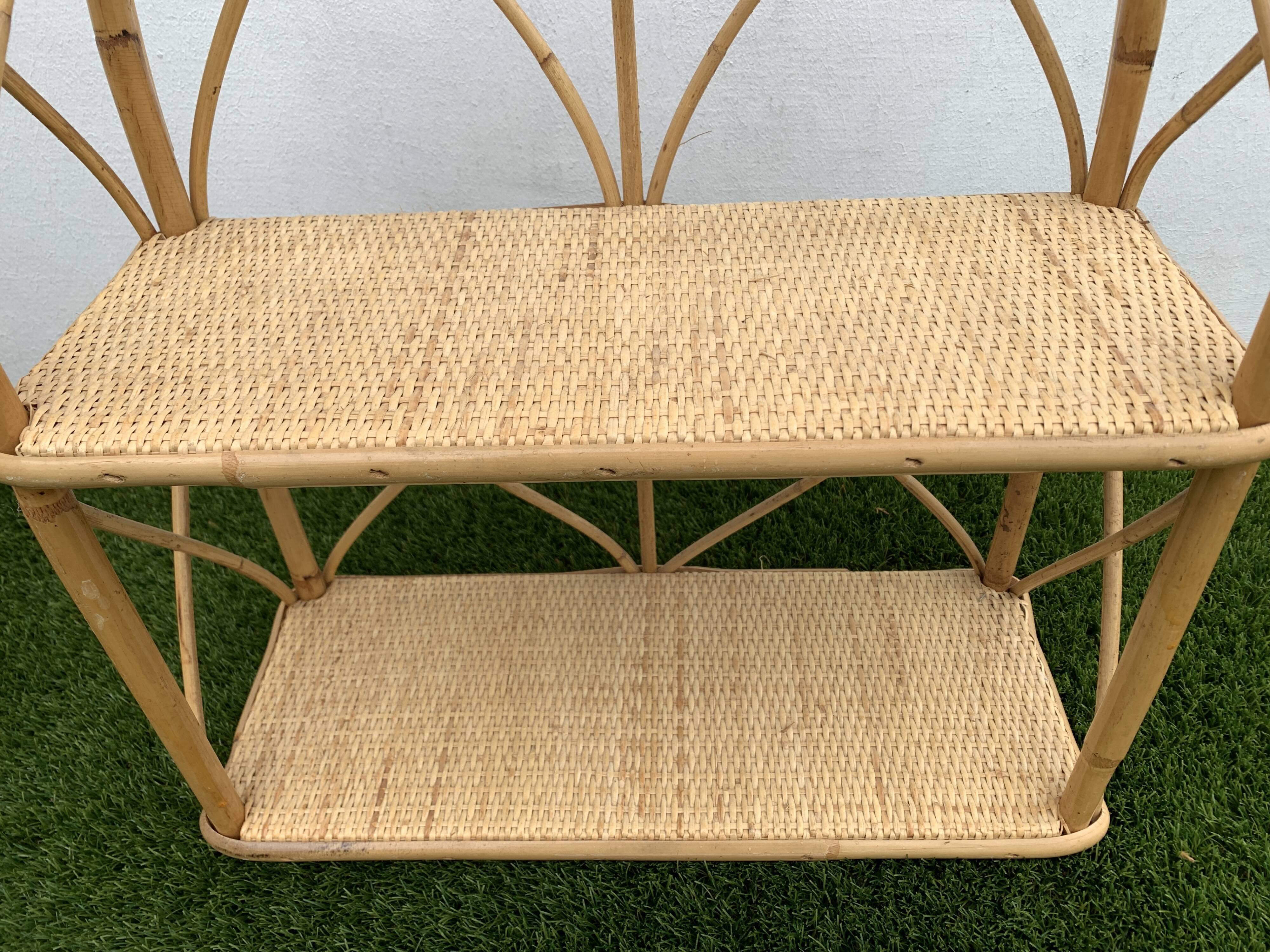 Pair of rattan and bamboo shelves or wall-bookcases, 1970