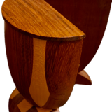 Bookends in exotic wood marquetry in the shape of a tambourine.