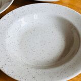 Set of 8 hollow plates in speckled ceramic