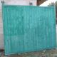 Old wooden door with pulley