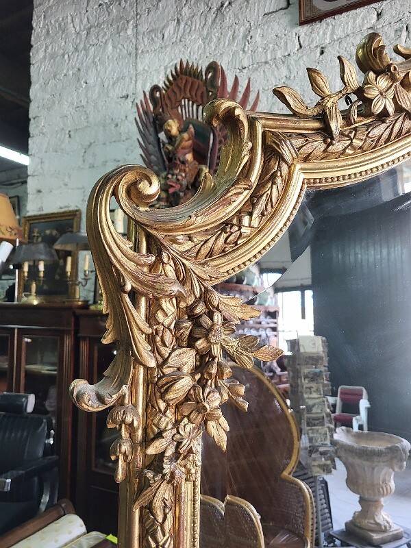 Large Louis XV gilded shell mirror from the 19th century