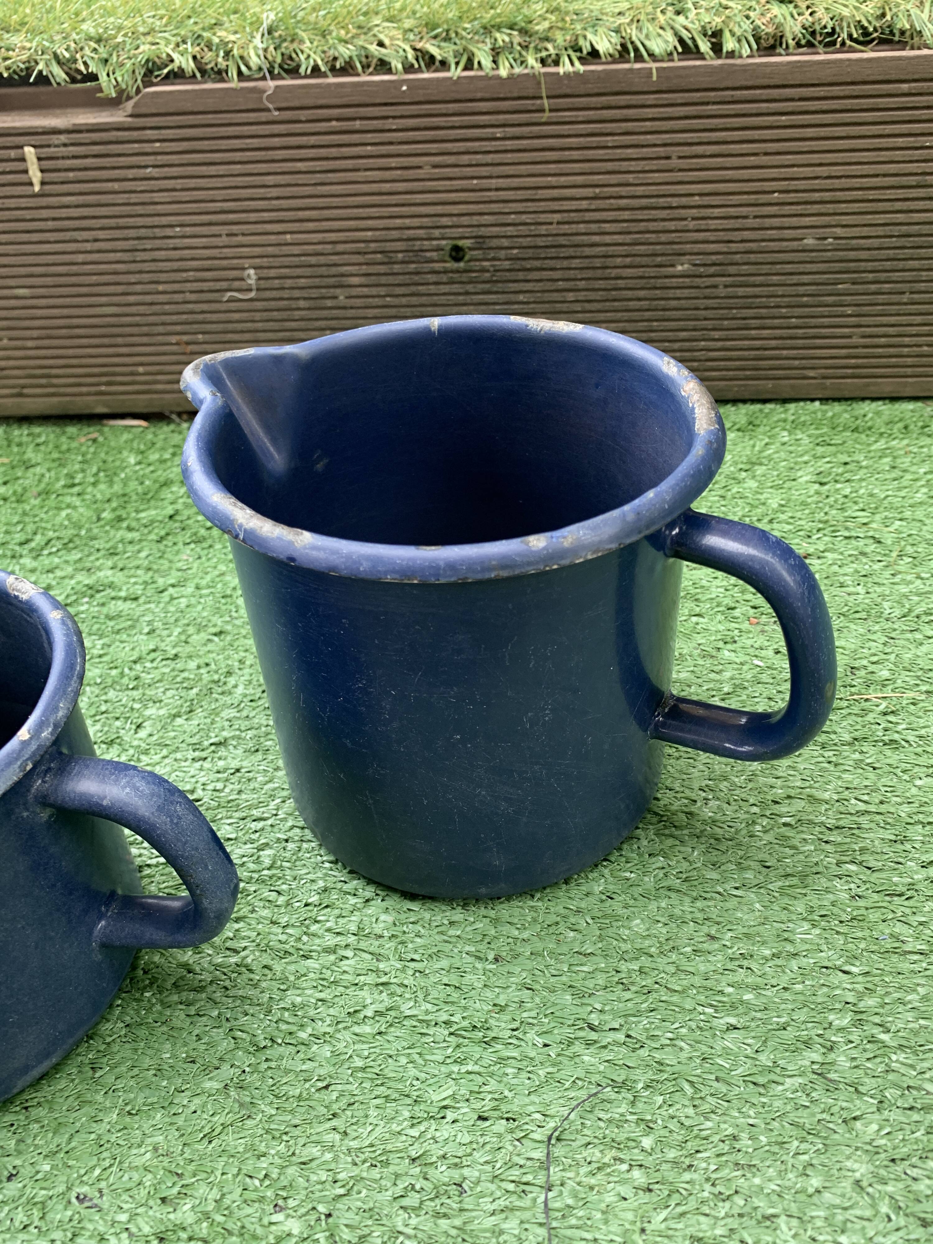 Pair of blue enamelled broc