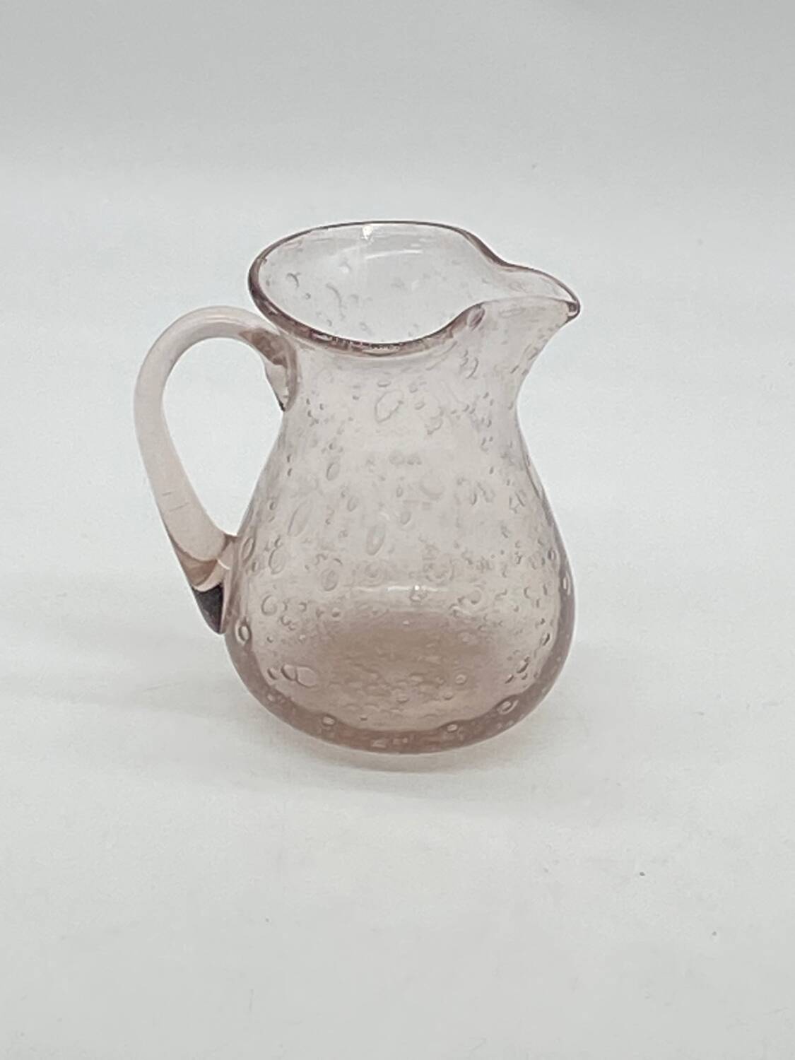 Biot style bubbled glass pitcher, pink tones, vintage