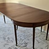 Extendable half-moon table in Louis XVI style