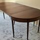 Extendable half-moon table in Louis XVI style