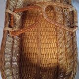 Old moses basket in wicker