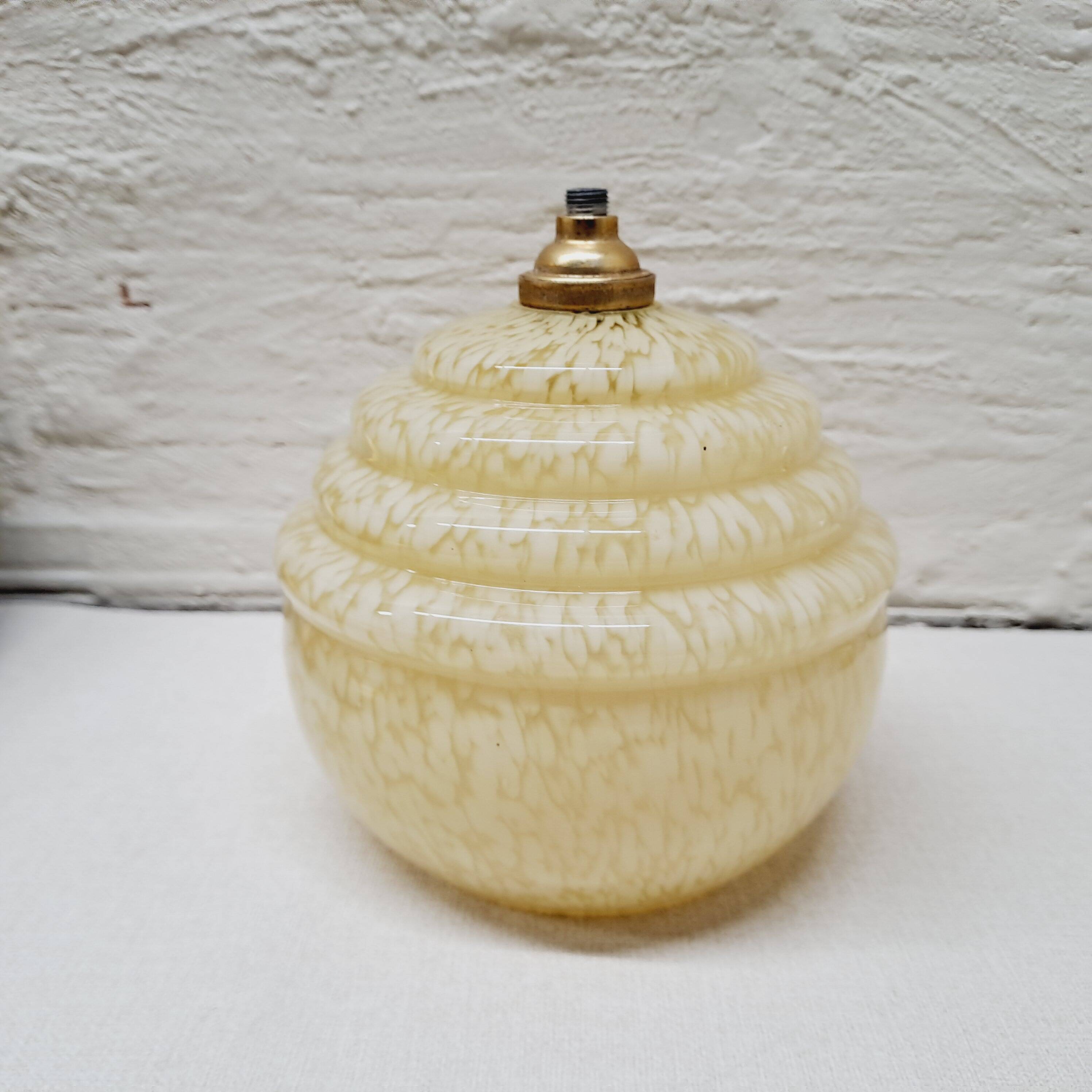 Pale yellow clichy glass globe