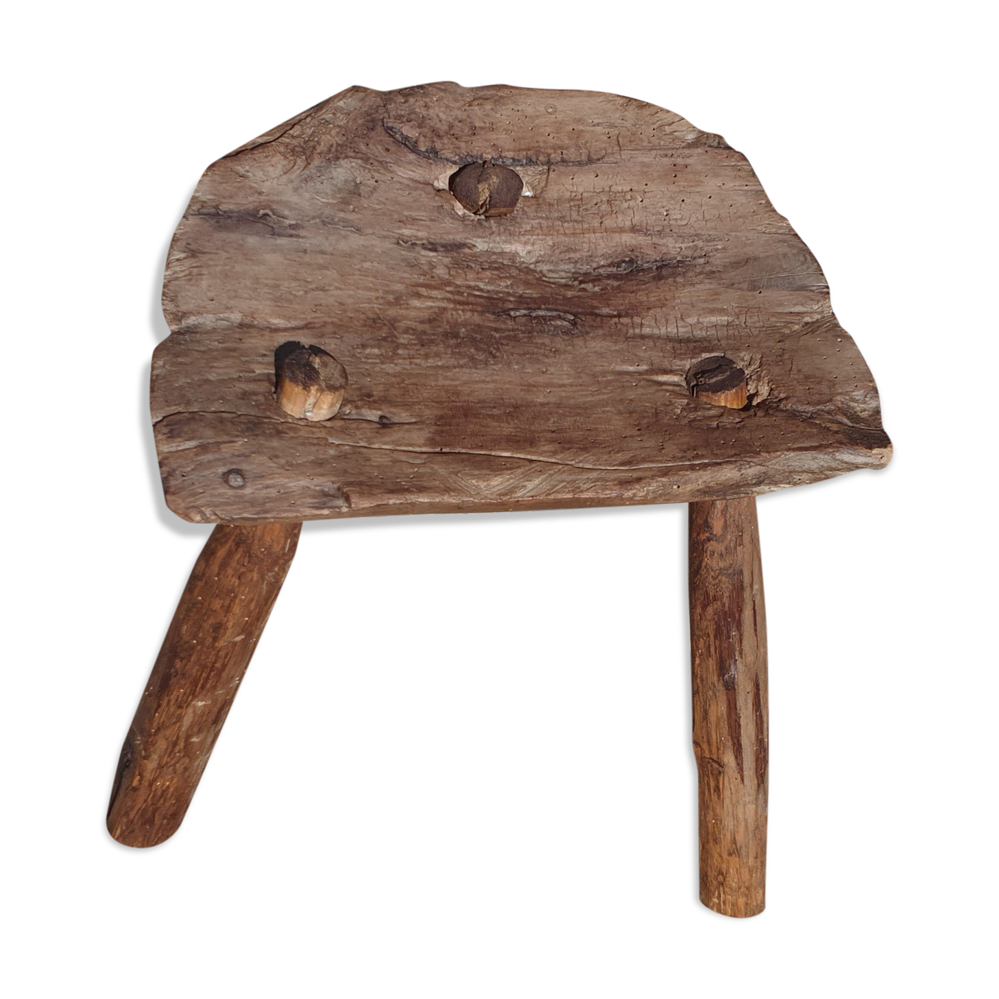 Ancient tripod milking stool