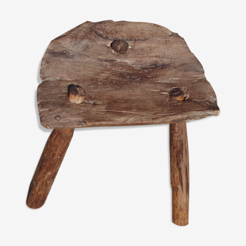 Ancient tripod milking stool